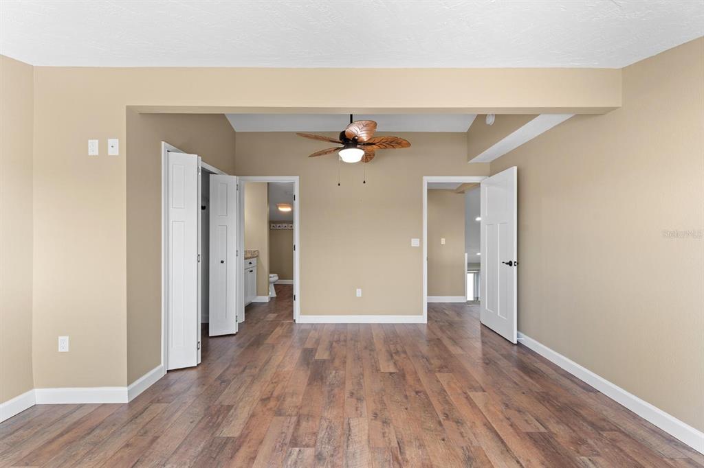 9604 Cortez Road West, Unit 136 Bradenton, FL 34210 - Photo 24 of 39 a view of an empty room and wooden floor