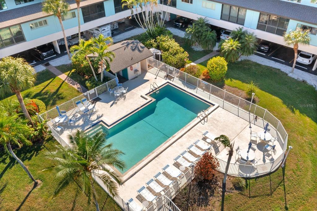 9604 Cortez Road West, Unit 136 Bradenton, FL 34210 - Photo 30 of 39 an aerial view of a house with a swimming pool