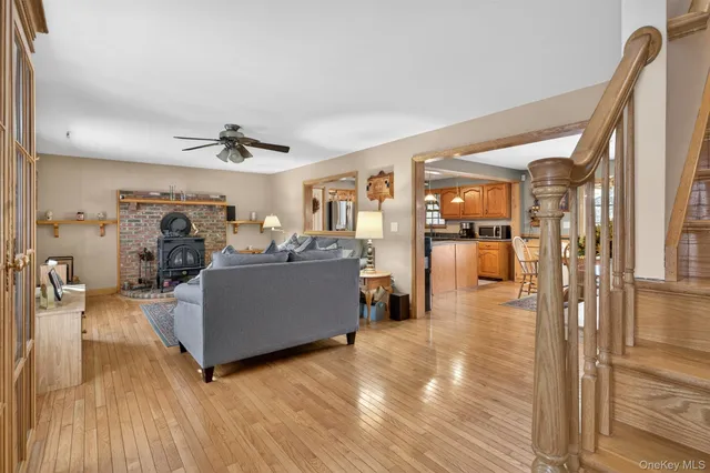 a living room with furniture and a rug
