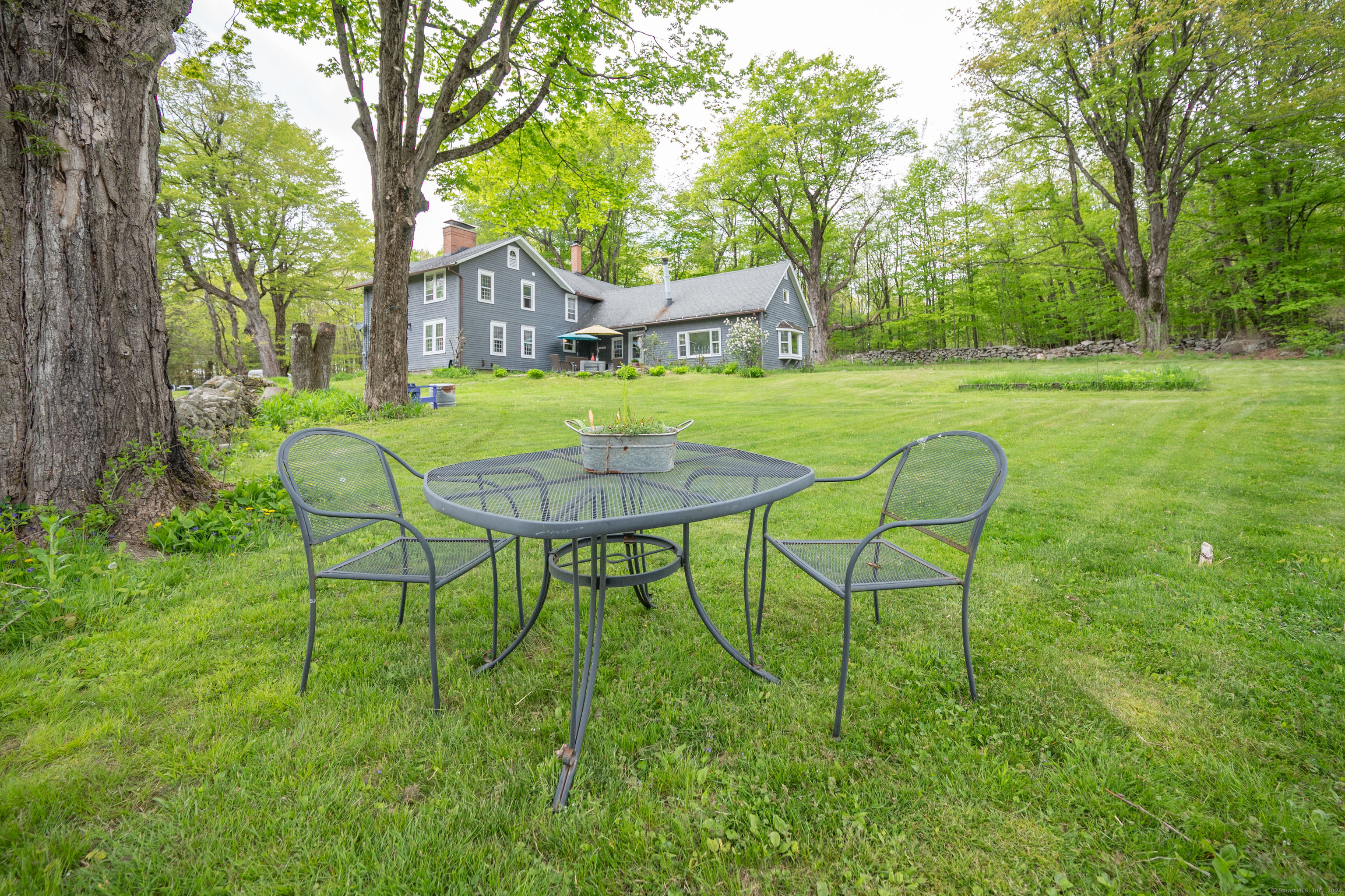 469 Platt Hill Road Winchester, CT 06098 - Photo 34 of 40 a house view with a seating space