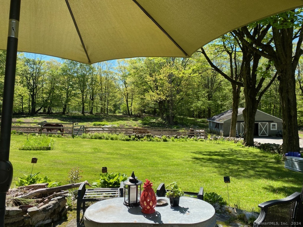 469 Platt Hill Road Winchester, CT 06098 - Photo 38 of 40 a view of a swimming pool and lounge chairs