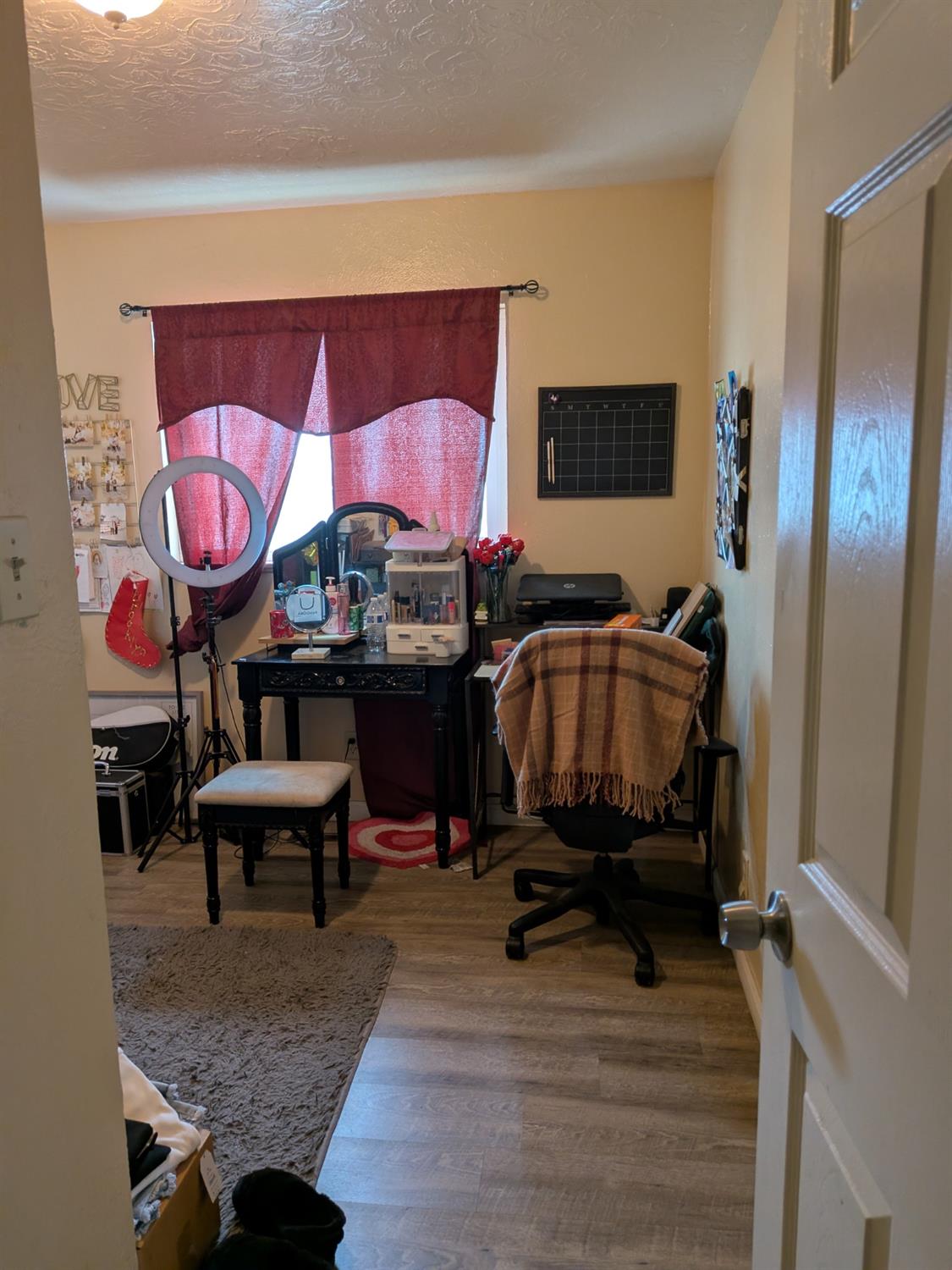 5209 North Angus Street Fresno, CA 93710 - Photo 19 of 33 a living room with furniture and a wooden floor