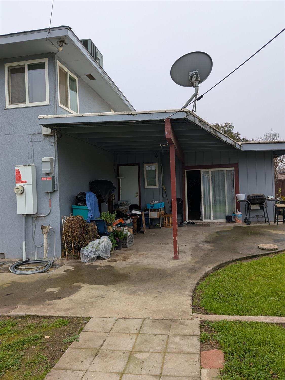 5209 North Angus Street Fresno, CA 93710 - Photo 8 of 33 a view of a house with backyard and porch