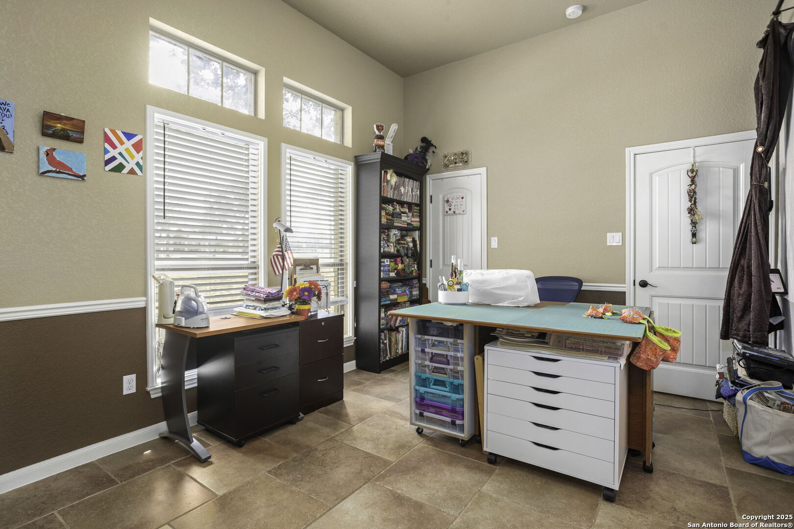 133 Copper Ridge Drive La Vernia, TX 78121 - Photo 20 of 35 a room with furniture a washer and a large window