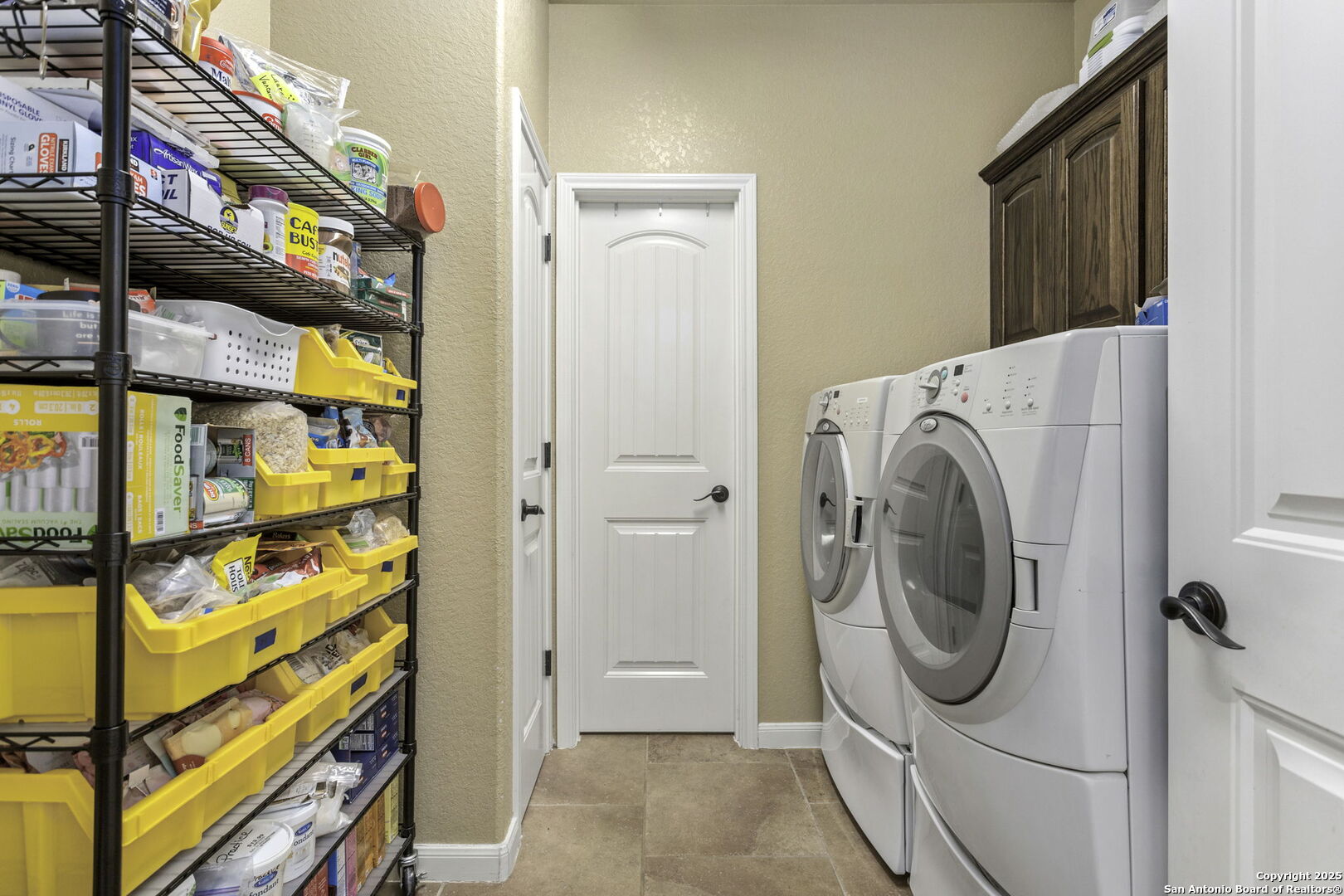 133 Copper Ridge Drive La Vernia, TX 78121 - Photo 24 of 35 a utility room with dryer and washer