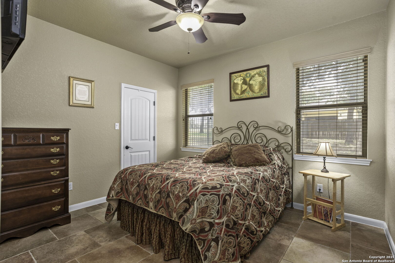 133 Copper Ridge Drive La Vernia, TX 78121 - Photo 26 of 35 a bedroom with a bed and a window