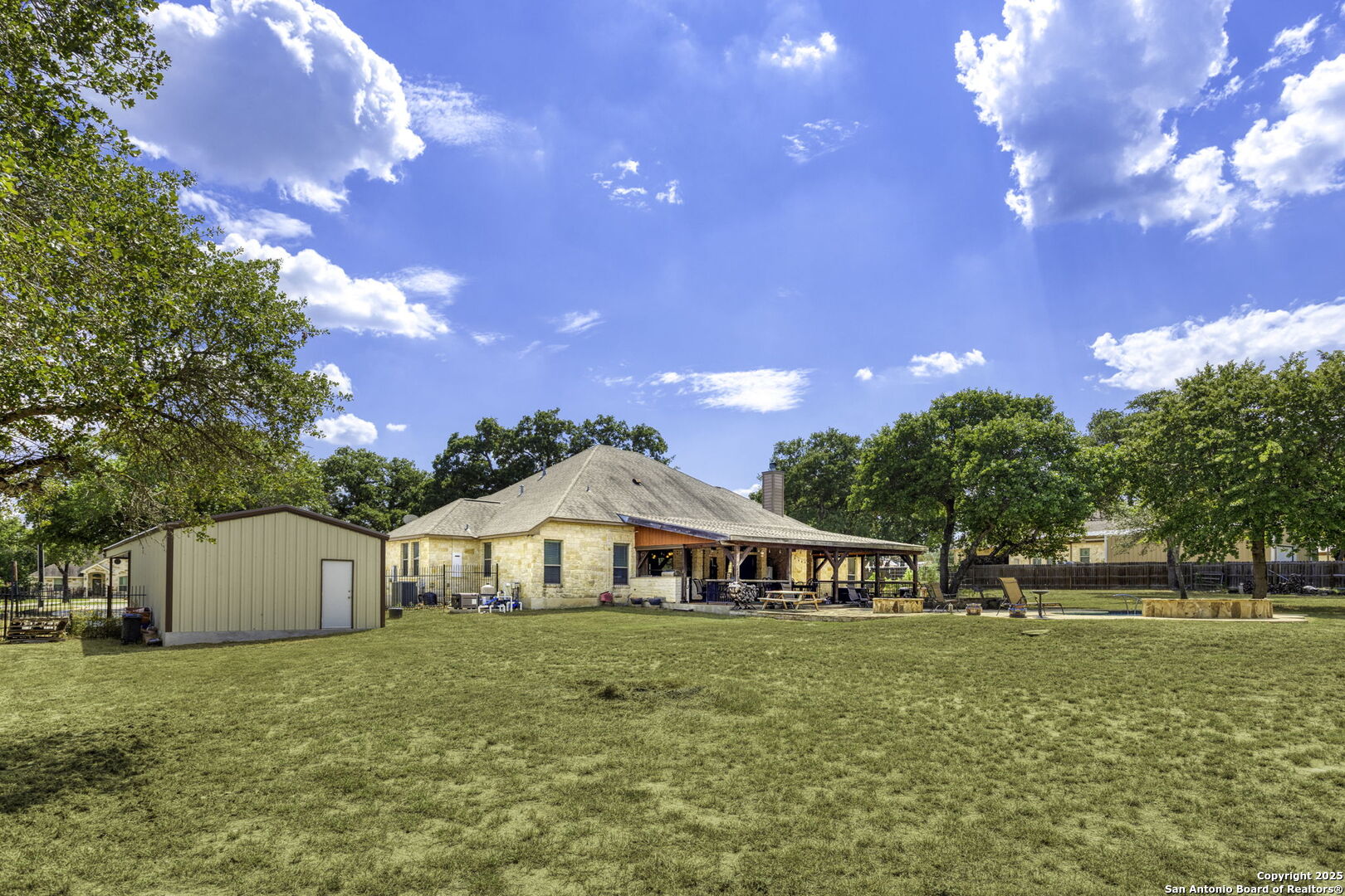 133 Copper Ridge Drive La Vernia, TX 78121 - Photo 31 of 35 a front view of a house with garden