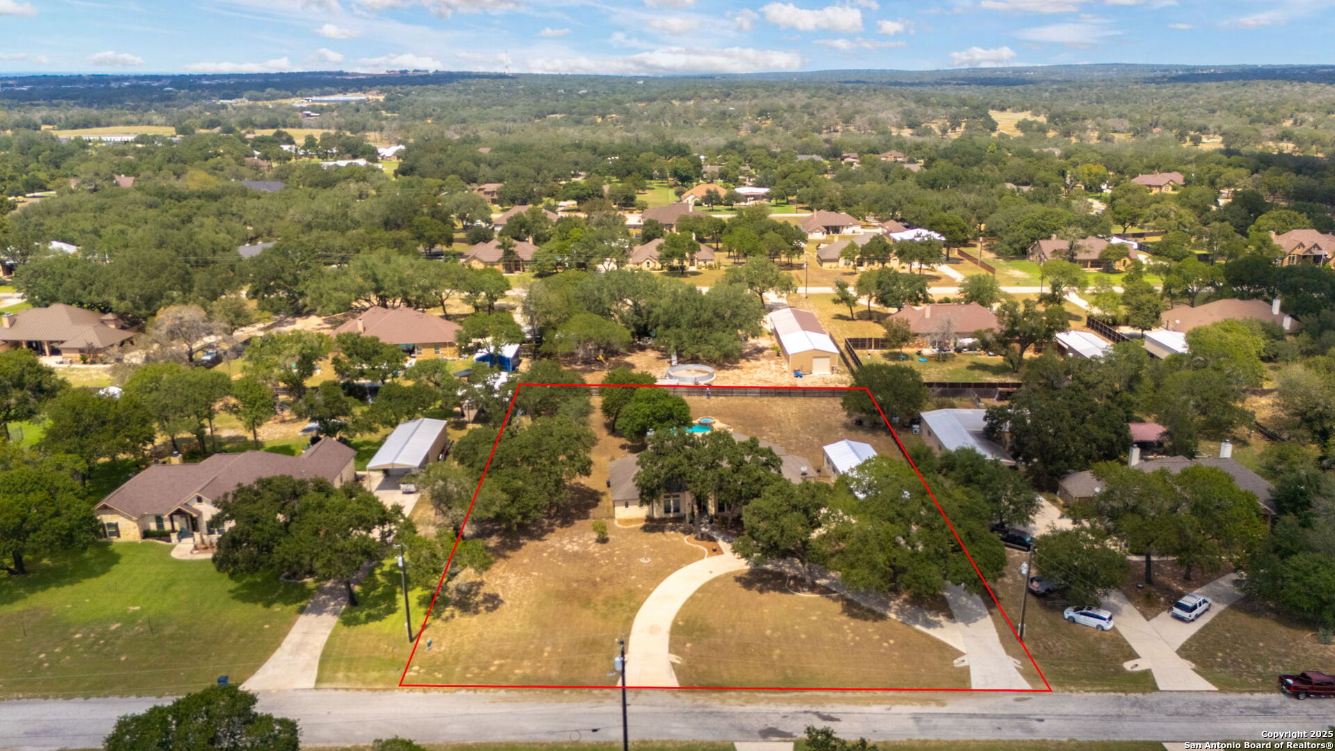 133 Copper Ridge Drive La Vernia, TX 78121 - Photo 33 of 35 a view of city and mountain