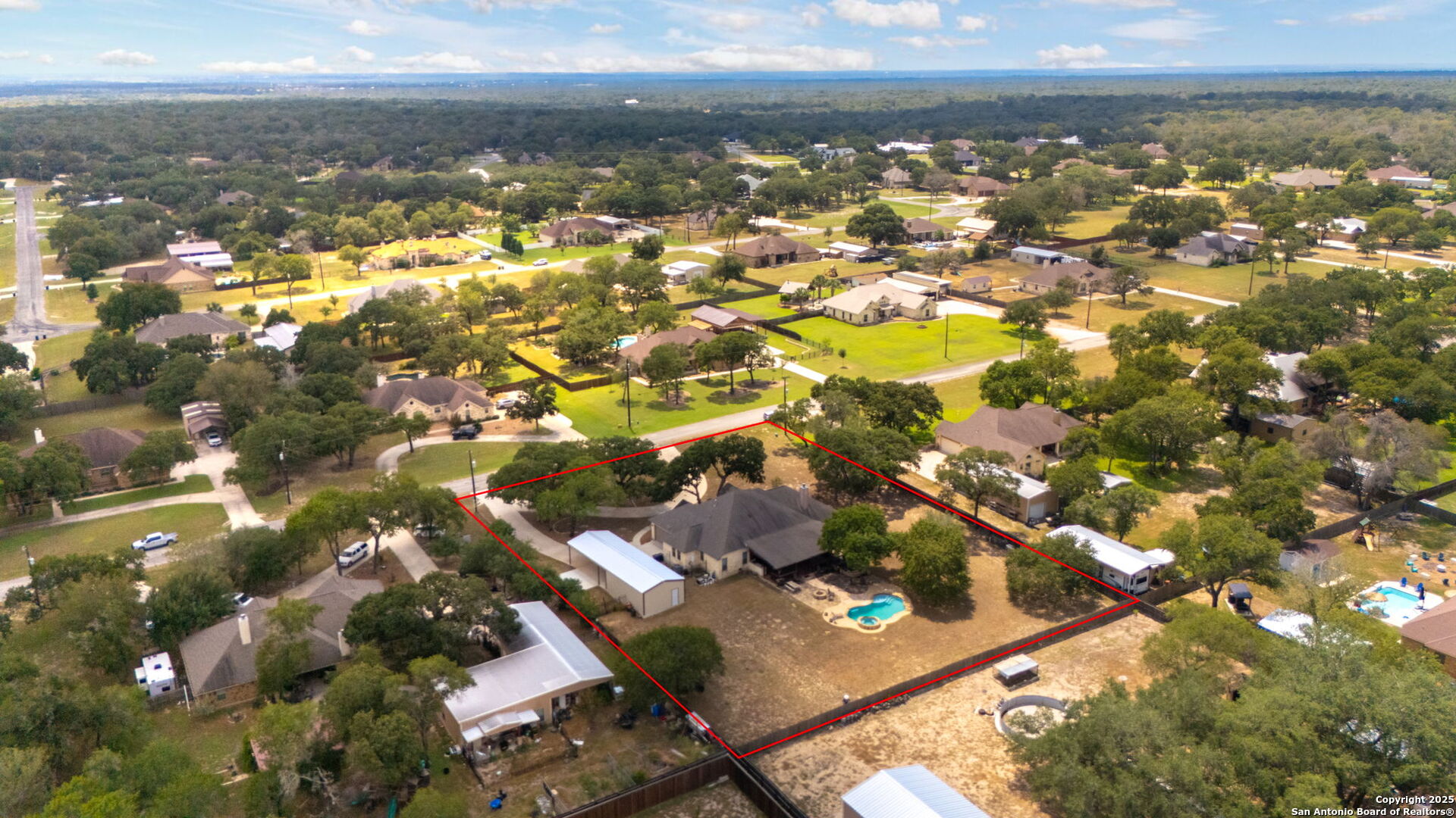 133 Copper Ridge Drive La Vernia, TX 78121 - Photo 34 of 35 view of city and mountain