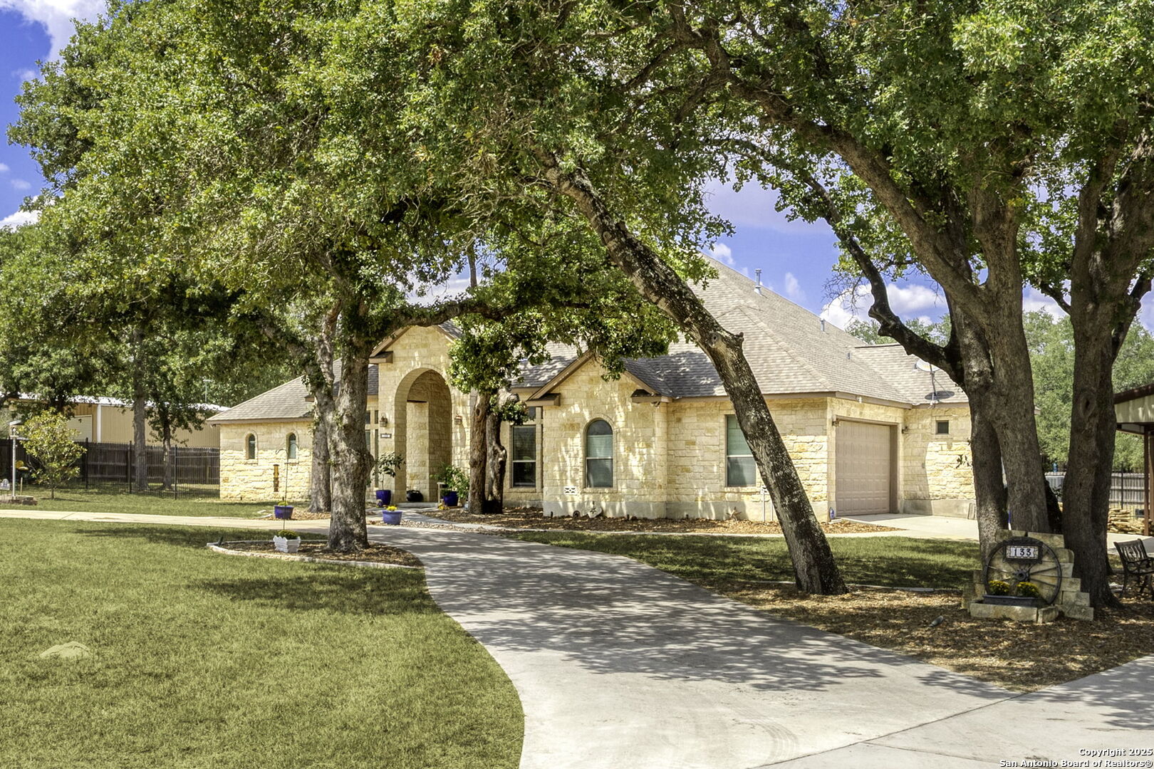 133 Copper Ridge Drive La Vernia, TX 78121 - Photo 8 of 35 a front view of a house with a yard