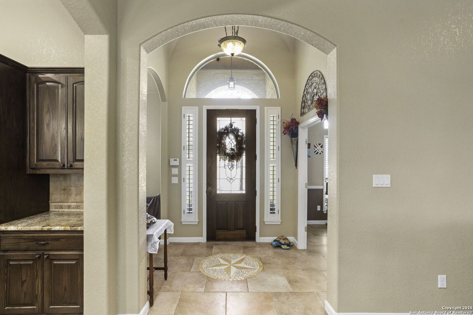 133 Copper Ridge Drive La Vernia, TX 78121 - Photo 10 of 35 a view of a livingroom with wooden floor and a large window