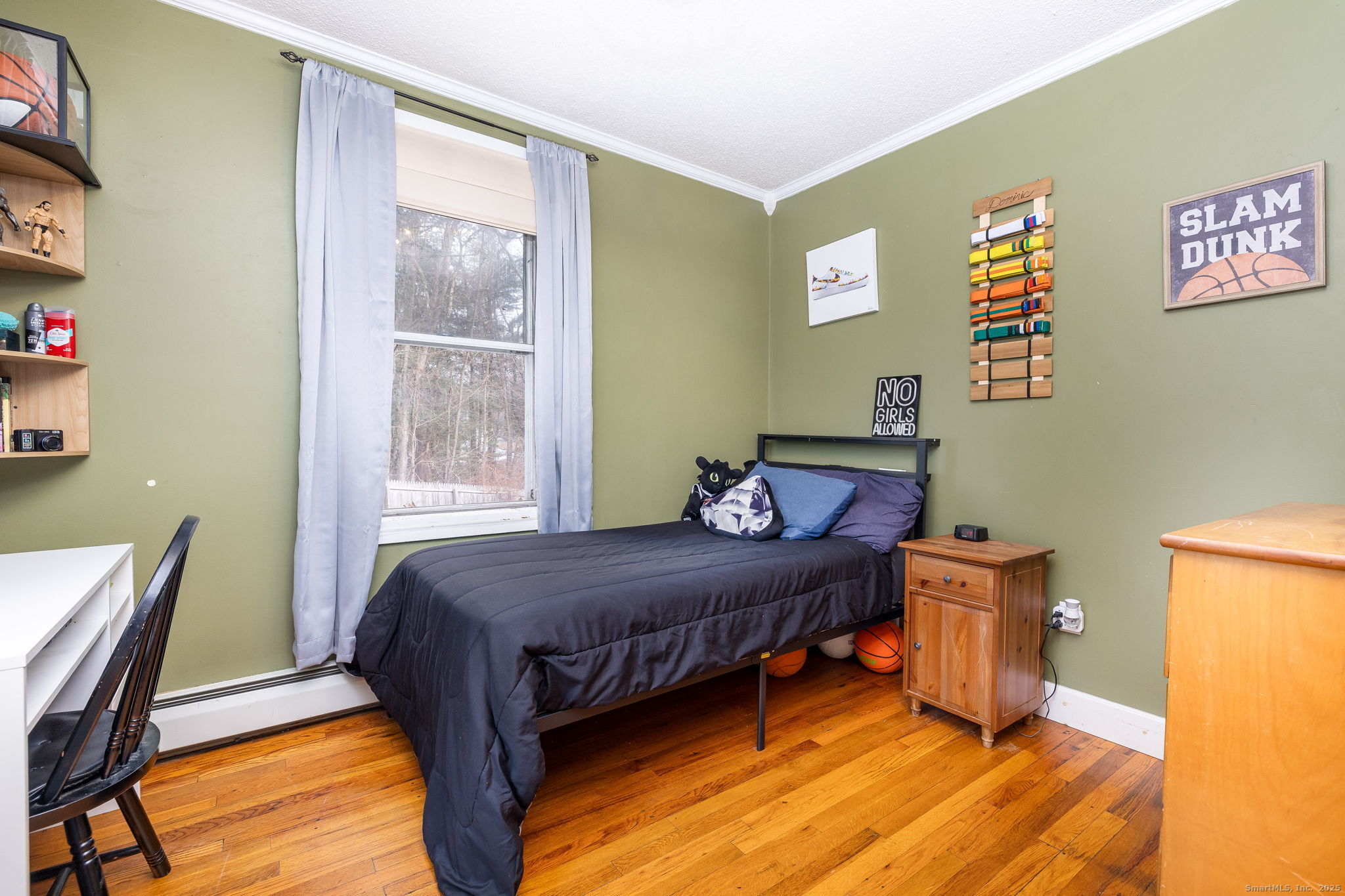 37 Carpenter Road Bolton, CT 06043 - Photo 11 of 17 a bedroom with a bed and wooden floor
