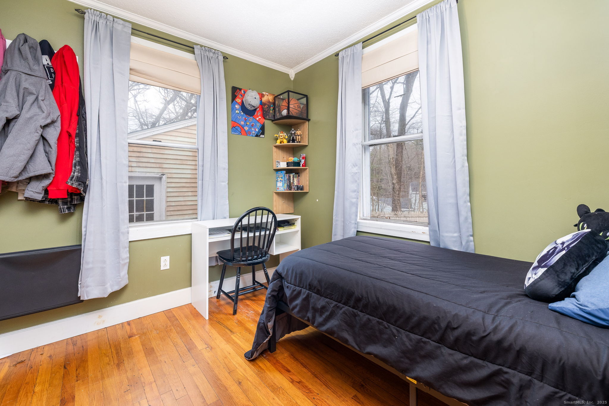 37 Carpenter Road Bolton, CT 06043 - Photo 12 of 17 a bedroom with a bed and a window