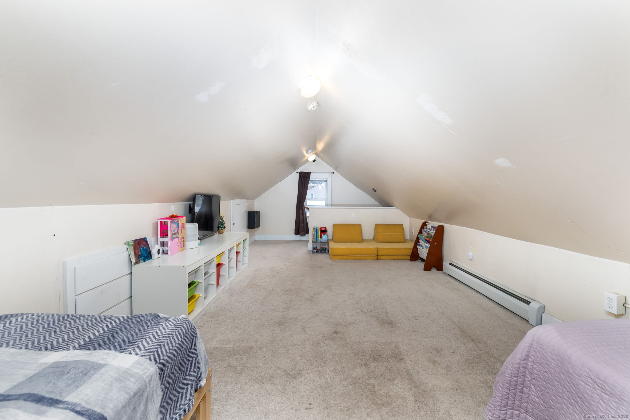 37 Carpenter Road Bolton, CT 06043 - Photo 14 of 17 a room with a bed and white walls