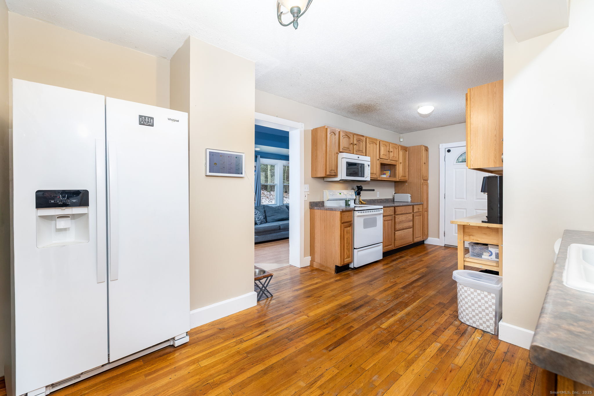 37 Carpenter Road Bolton, CT 06043 - Photo 6 of 17 a kitchen with stainless steel appliances a refrigerator and a stove top oven