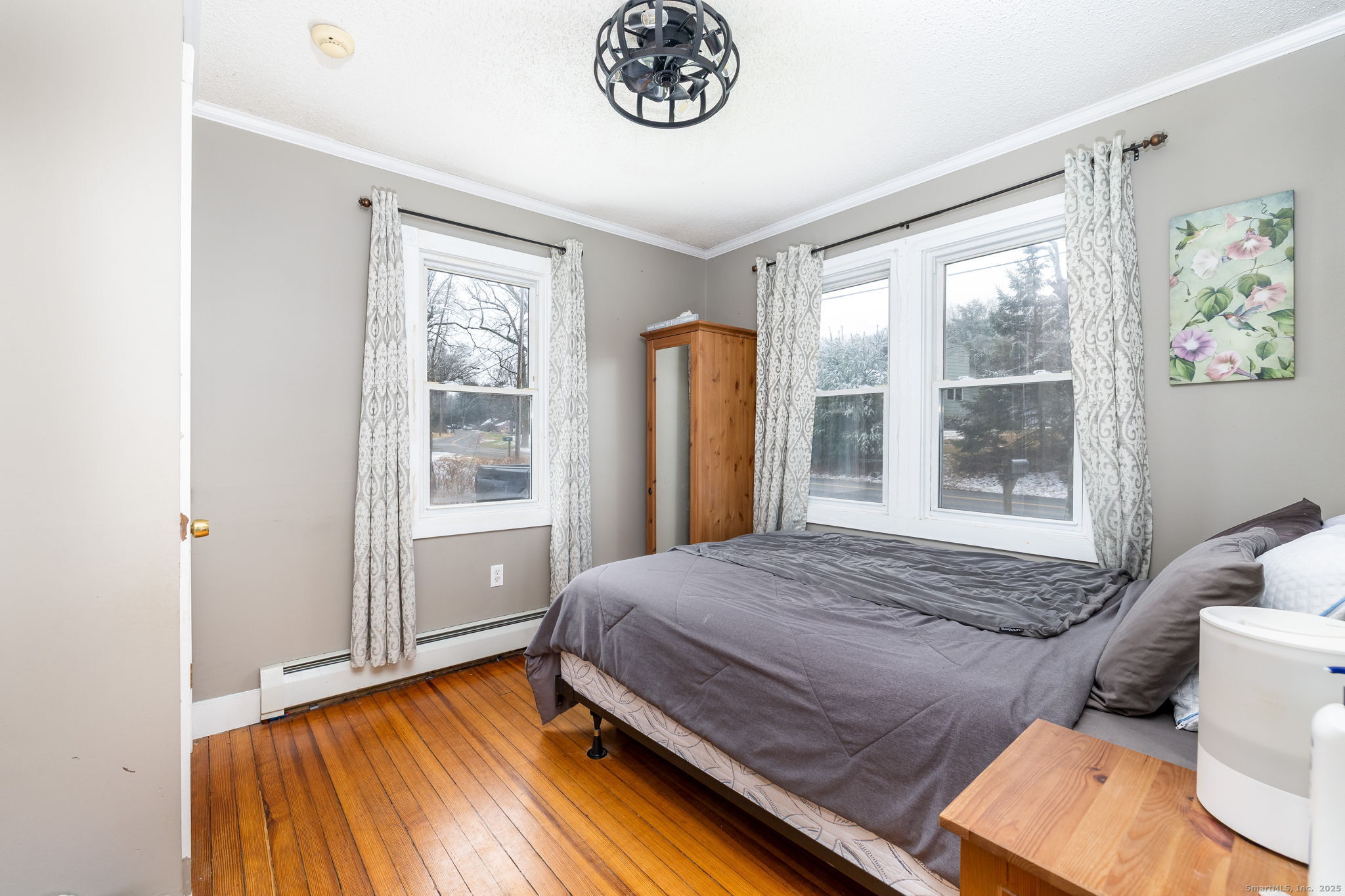 37 Carpenter Road Bolton, CT 06043 - Photo 10 of 17 a bedroom with a bed and a window