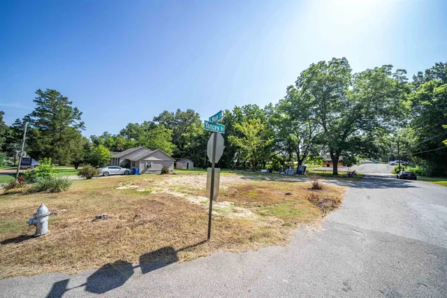 a view of a playground with basketball court