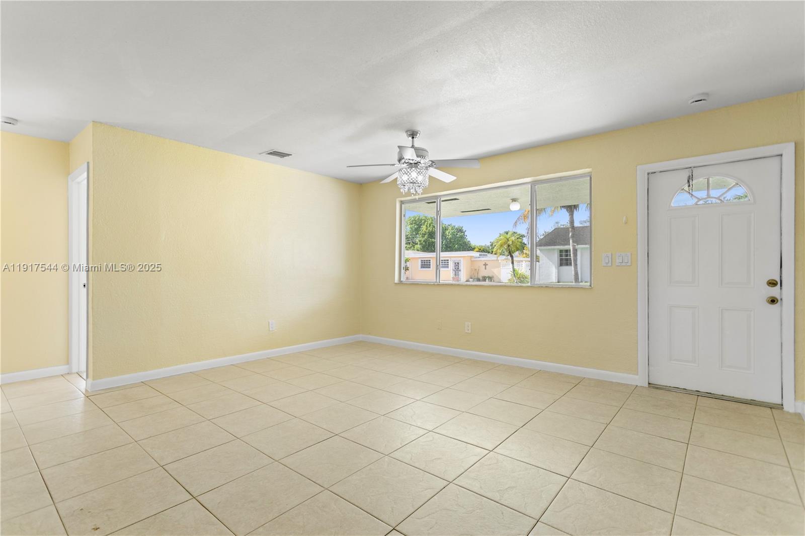 1831 Southwest 97th Terrace Miramar, FL 33025 - Photo 2 of 61 a view of an empty room with a window