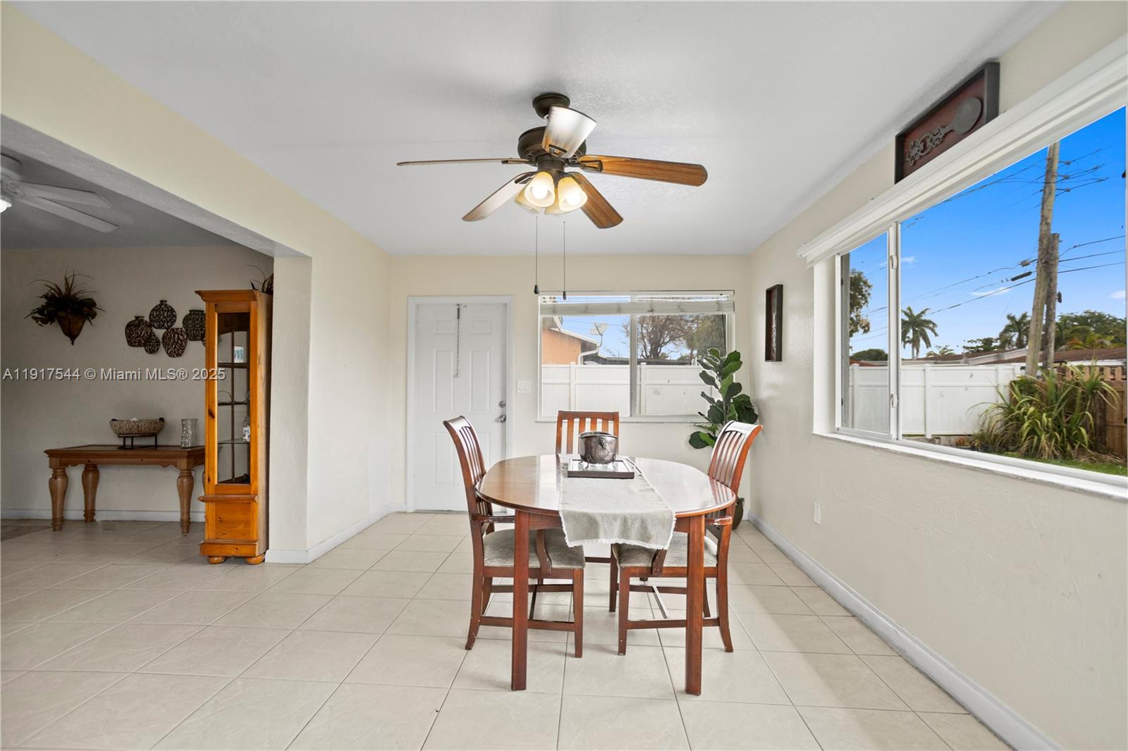 1831 Southwest 97th Terrace Miramar, FL 33025 - Photo 33 of 61 a view of a dining room with furniture