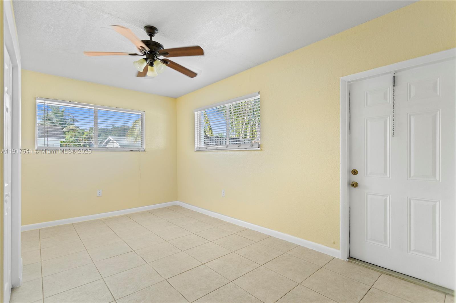 1831 Southwest 97th Terrace Miramar, FL 33025 - Photo 41 of 61 a view of a big room with wooden floor and closet area