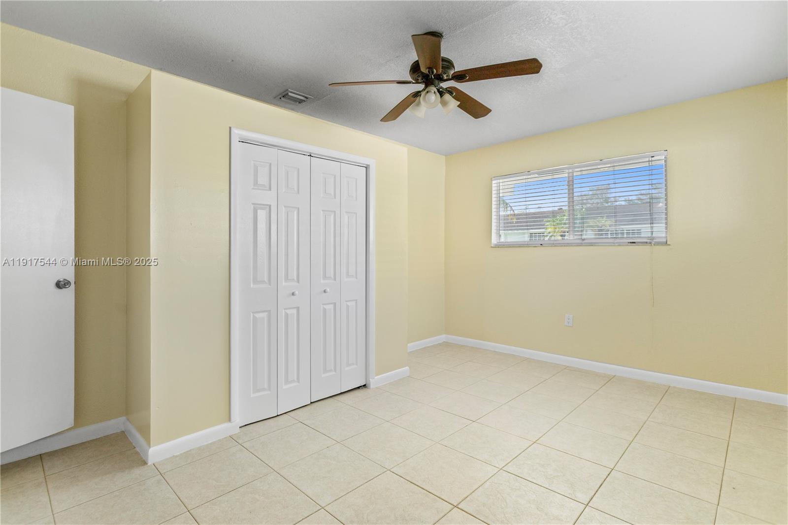 1831 Southwest 97th Terrace Miramar, FL 33025 - Photo 42 of 61 a view of room with ceiling fan