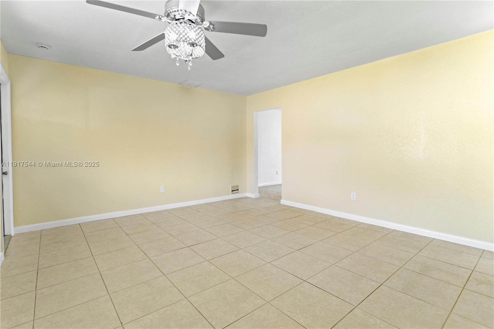 1831 Southwest 97th Terrace Miramar, FL 33025 - Photo 5 of 61 a view of an empty room with a window