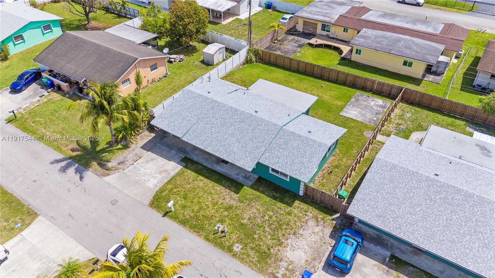 1831 Southwest 97th Terrace Miramar, FL 33025 - Photo 57 of 61 an aerial view of a house with a garden and swimming pool
