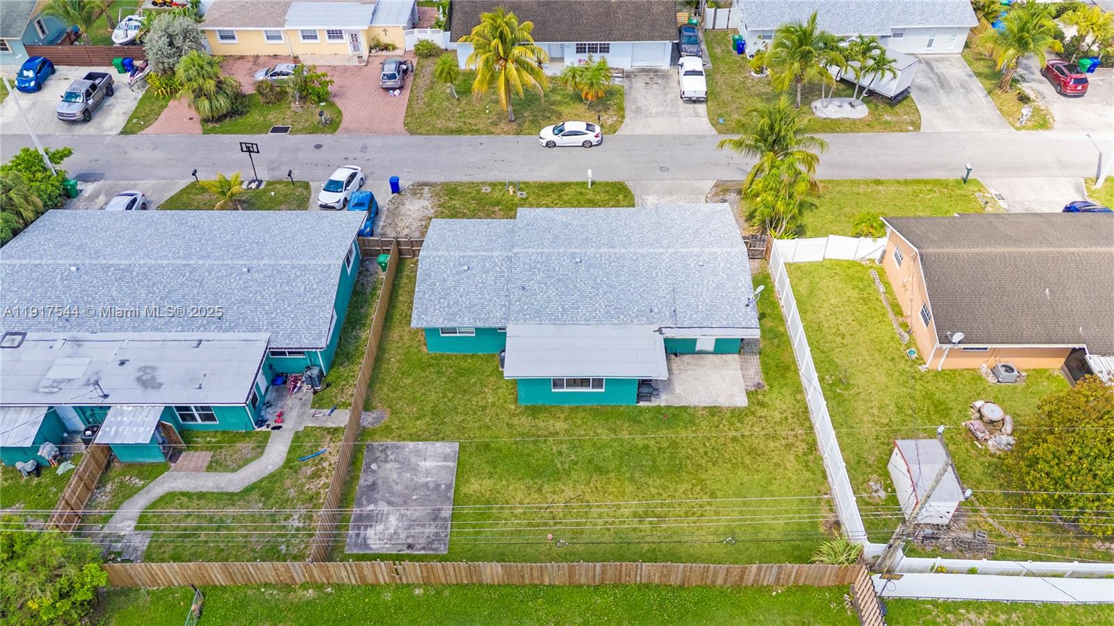 1831 Southwest 97th Terrace Miramar, FL 33025 - Photo 59 of 61 an aerial view of residential houses with outdoor space and swimming pool