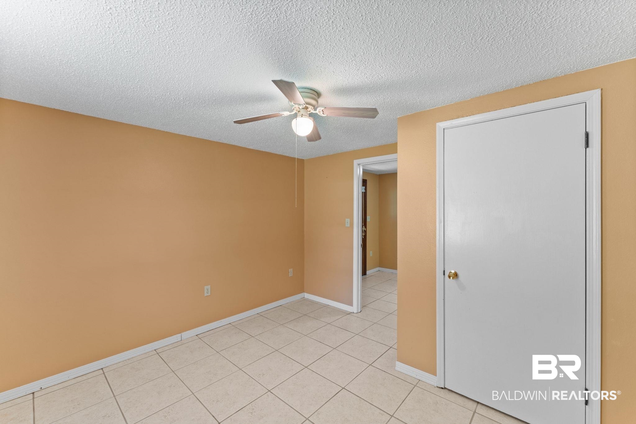 14095 Riverside Drive Foley, AL 36535 - Photo 17 of 30 Unfurnished room with ceiling fan, a textured ceiling, and light tile patterned flooring
