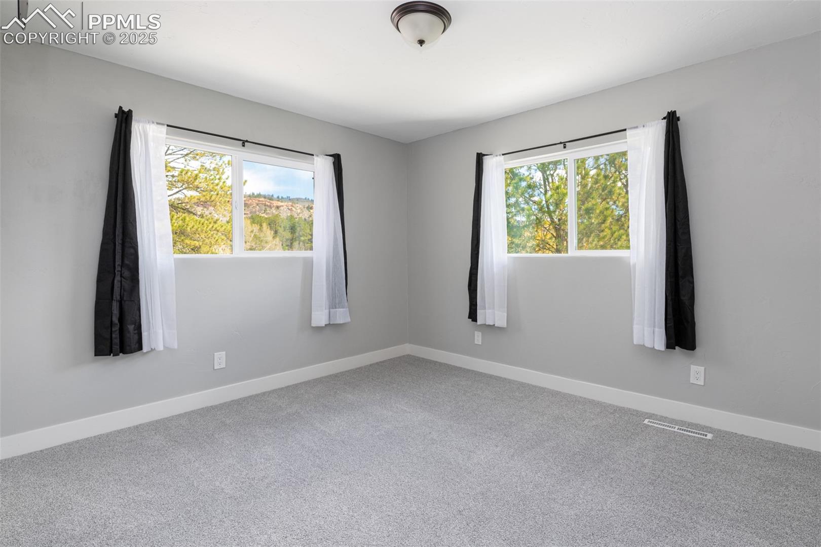 721 Forest View Road Monument, CO 80132 - Photo 36 of 47 On the upper level good size bedroom with closet