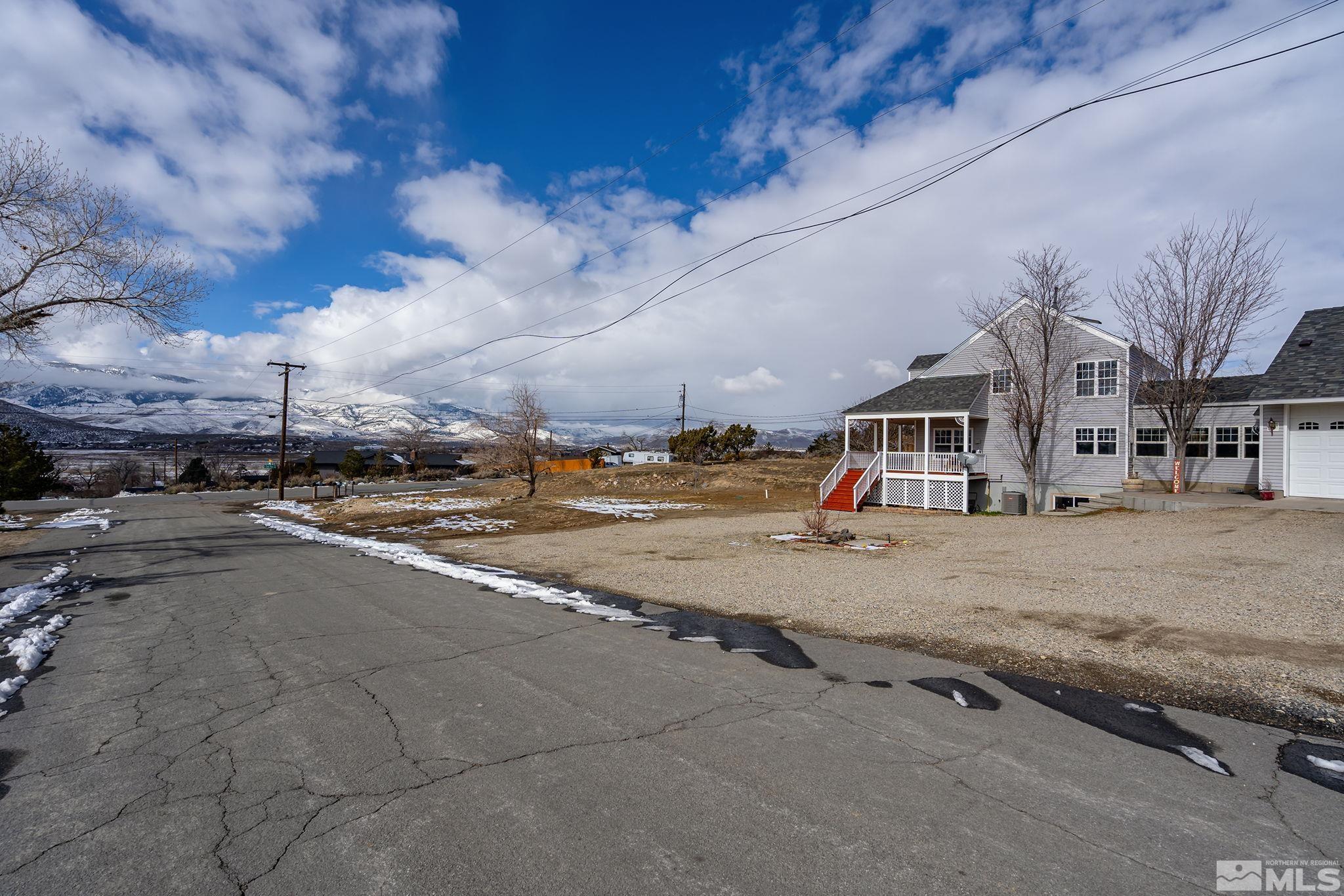 5960 Mallow Road Carson City, NV 89701 - Photo 20 of 34 a view of a street with houses