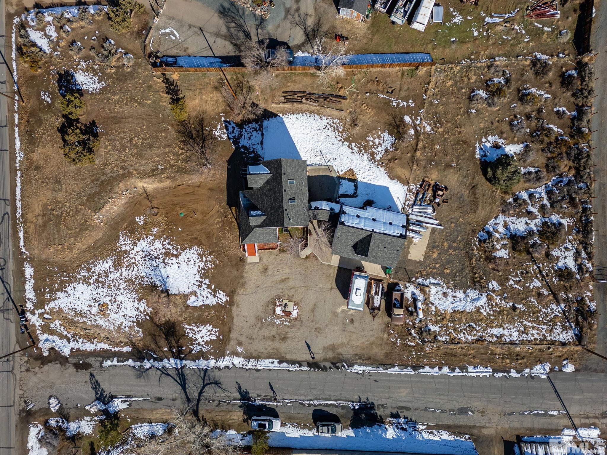 5960 Mallow Road Carson City, NV 89701 - Photo 30 of 34 a view of a house with a yard
