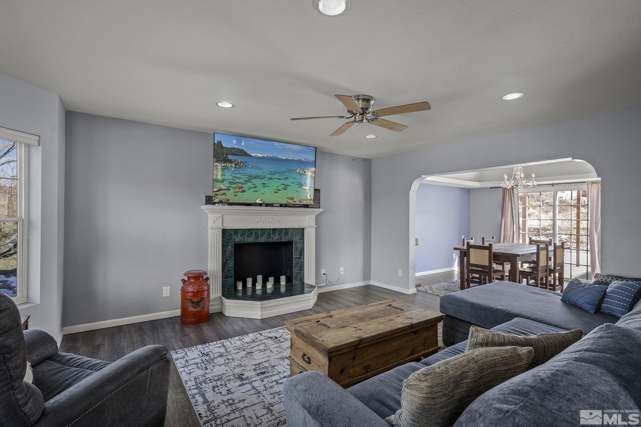 5960 Mallow Road Carson City, NV 89701 - Photo 5 of 34 a living room with furniture and a fireplace