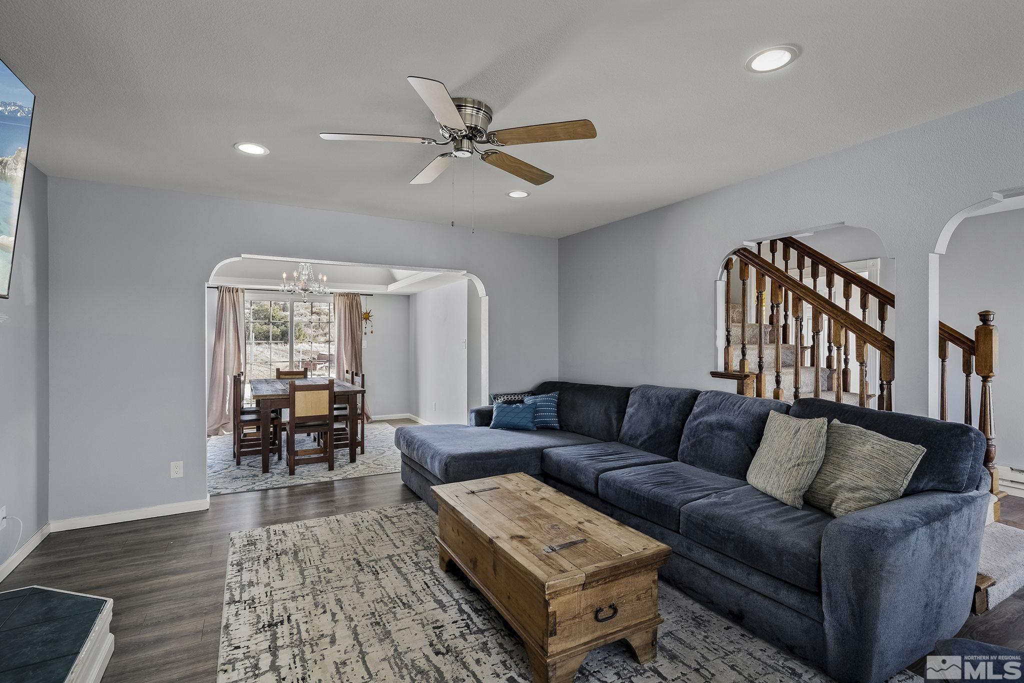 5960 Mallow Road Carson City, NV 89701 - Photo 6 of 34 a living room with furniture and a wooden floor