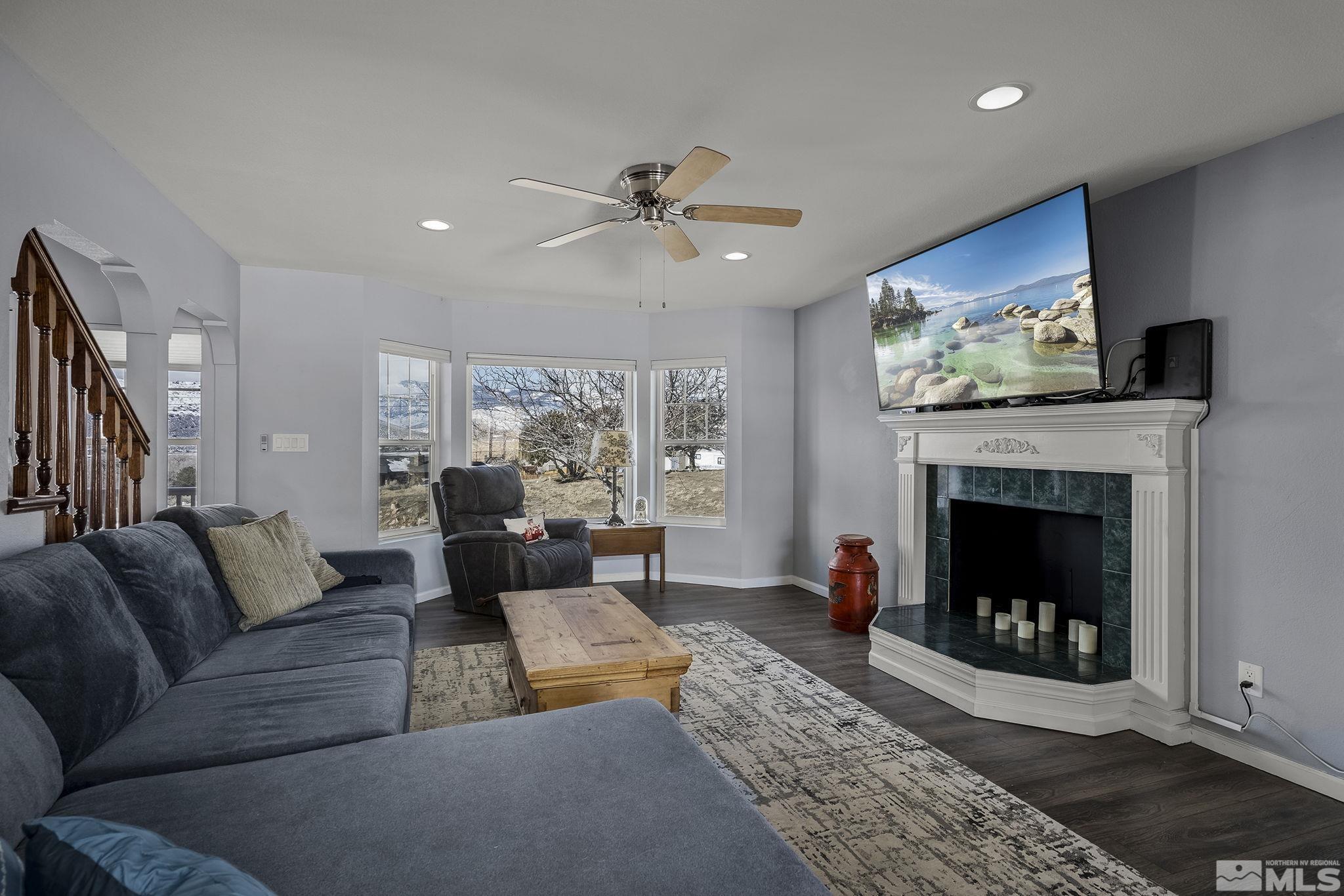 5960 Mallow Road Carson City, NV 89701 - Photo 7 of 34 a living room with furniture and a fireplace