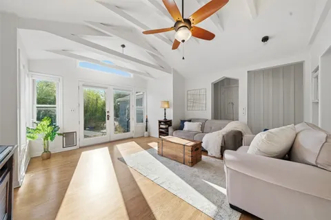 a kitchen with a stove a sink and a refrigerator