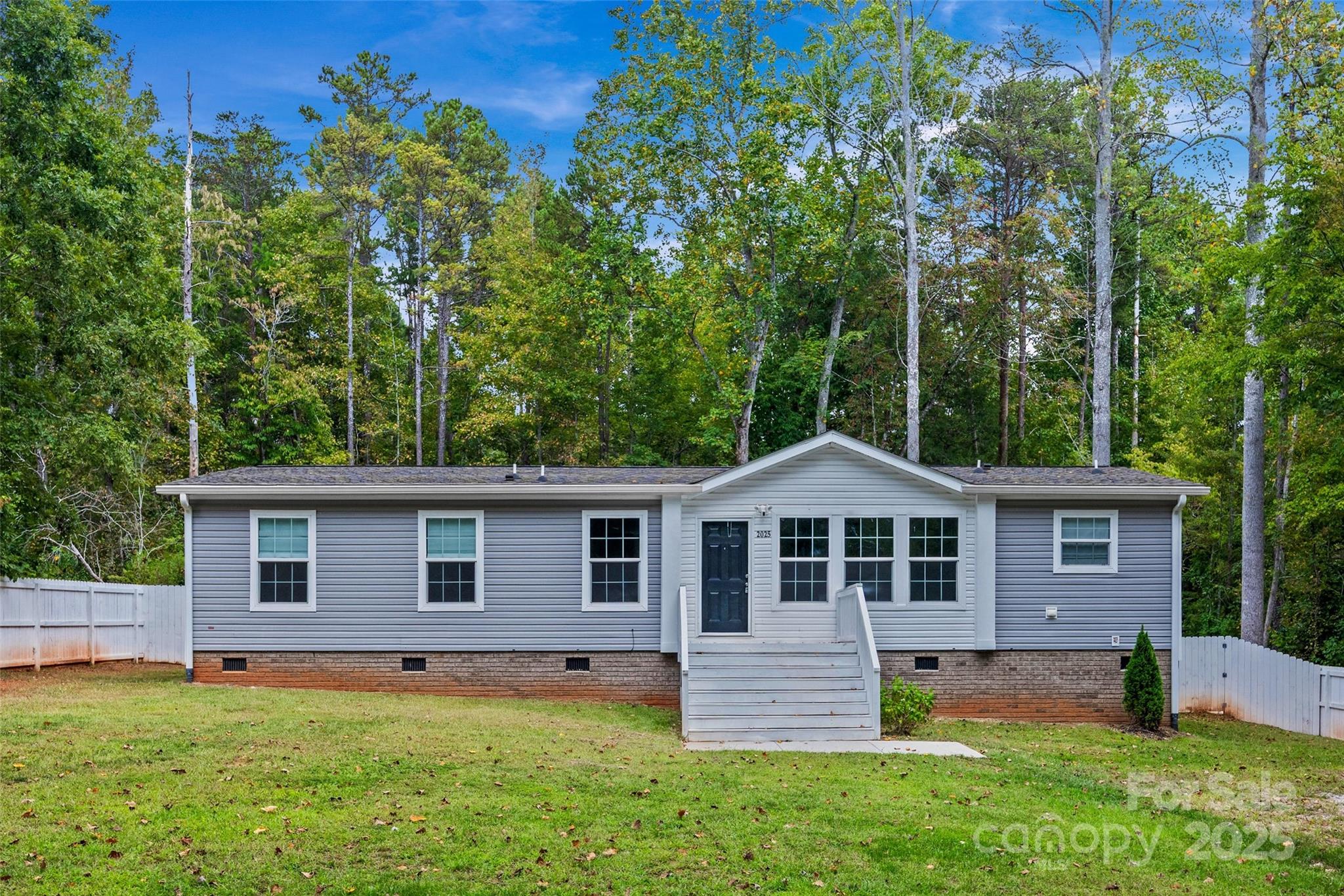 2025 Kisatchie Drive Hickory Grove, SC 29717 - Photo 1 of 33 front view of a house with a yard