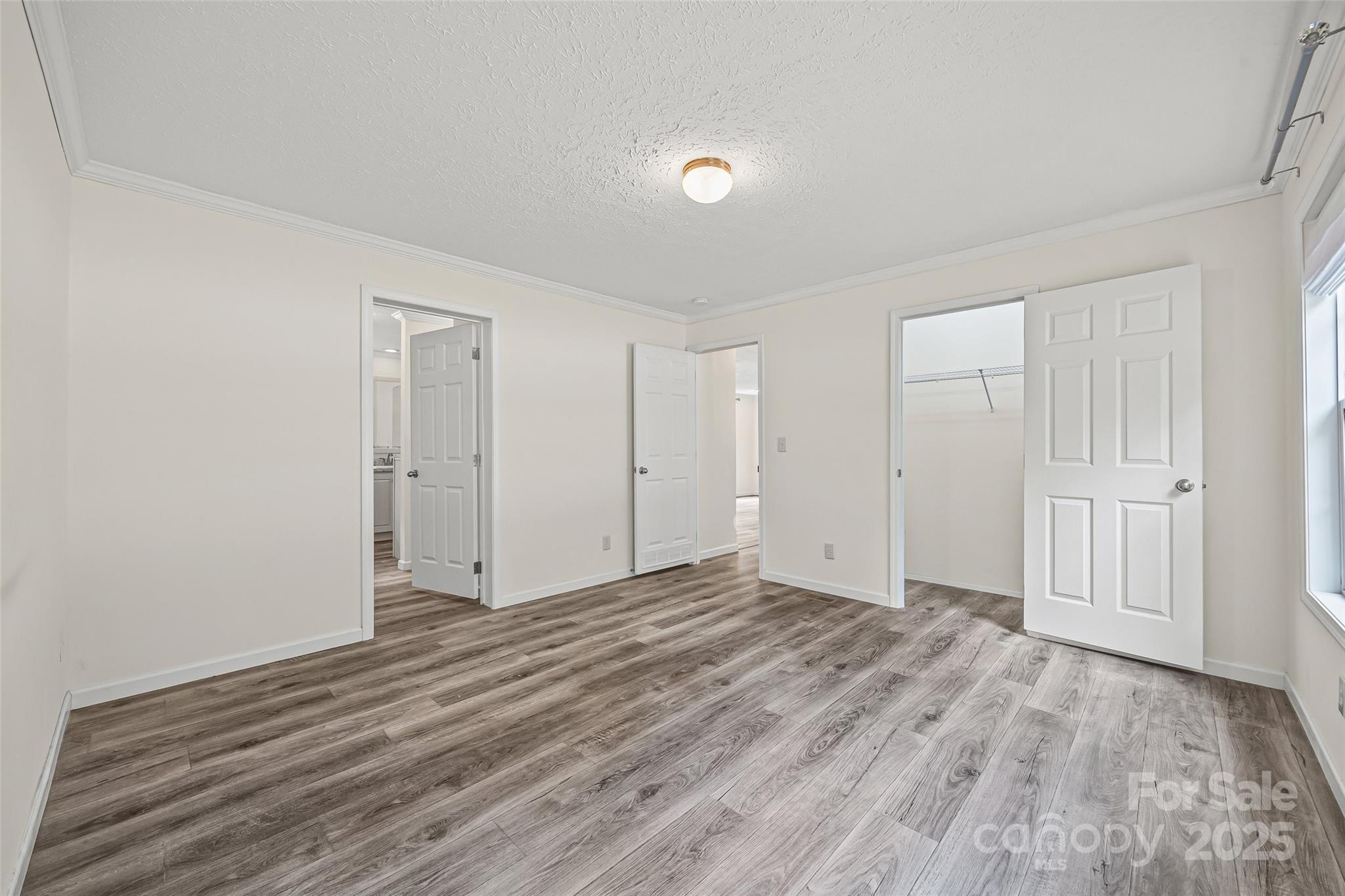 2025 Kisatchie Drive Hickory Grove, SC 29717 - Photo 15 of 33 a view of an empty room with wooden floor