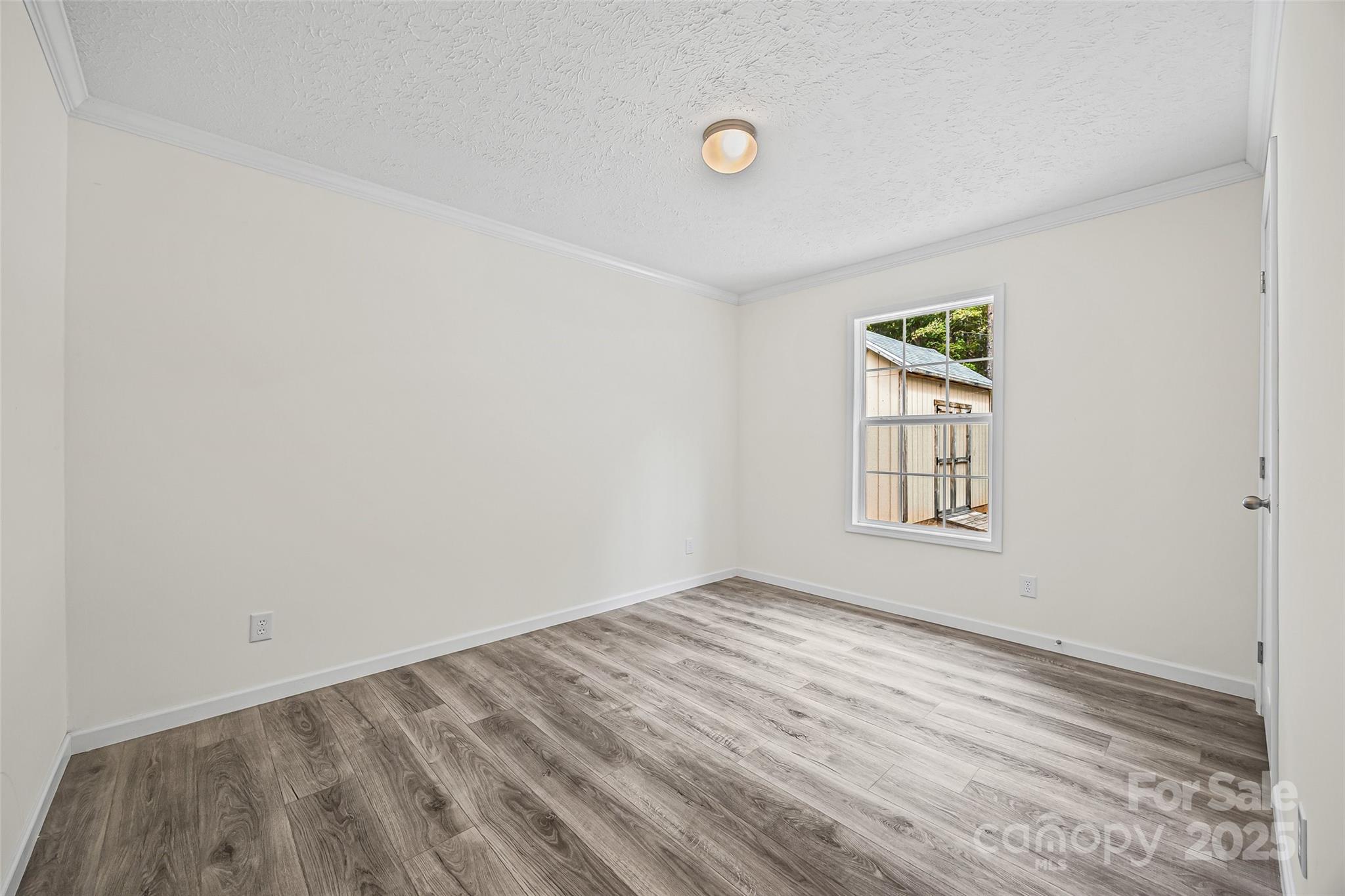 2025 Kisatchie Drive Hickory Grove, SC 29717 - Photo 20 of 33 an empty room with windows