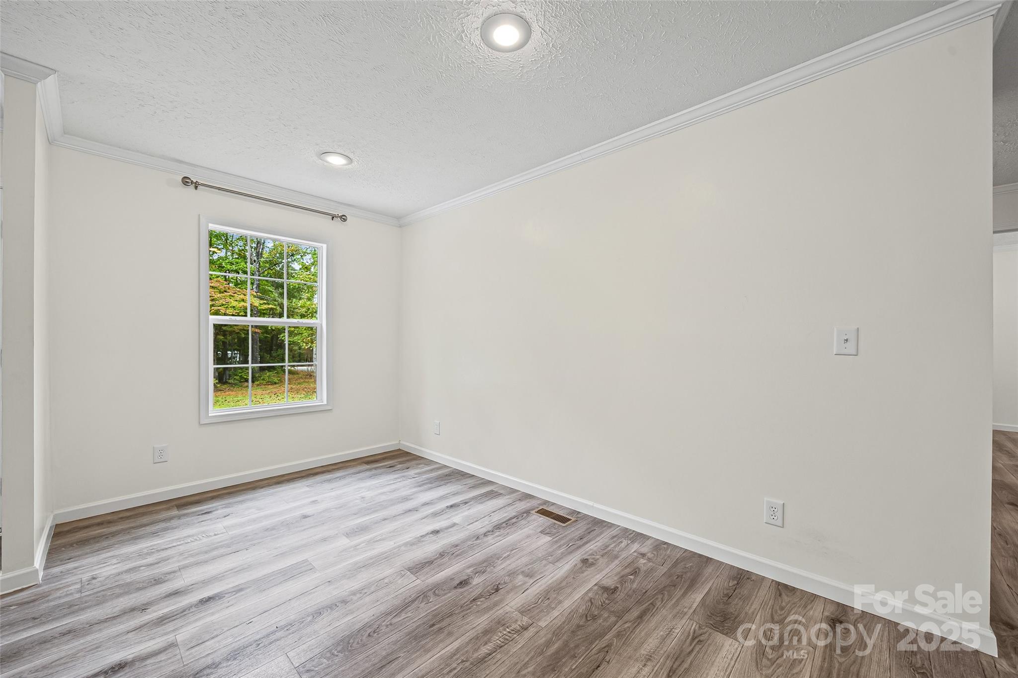 2025 Kisatchie Drive Hickory Grove, SC 29717 - Photo 7 of 33 a view of room with window and hardwood floor