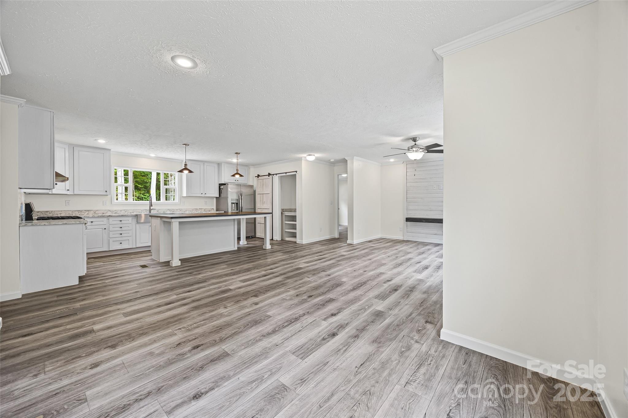 2025 Kisatchie Drive Hickory Grove, SC 29717 - Photo 8 of 33 a view of a kitchen with wooden floor