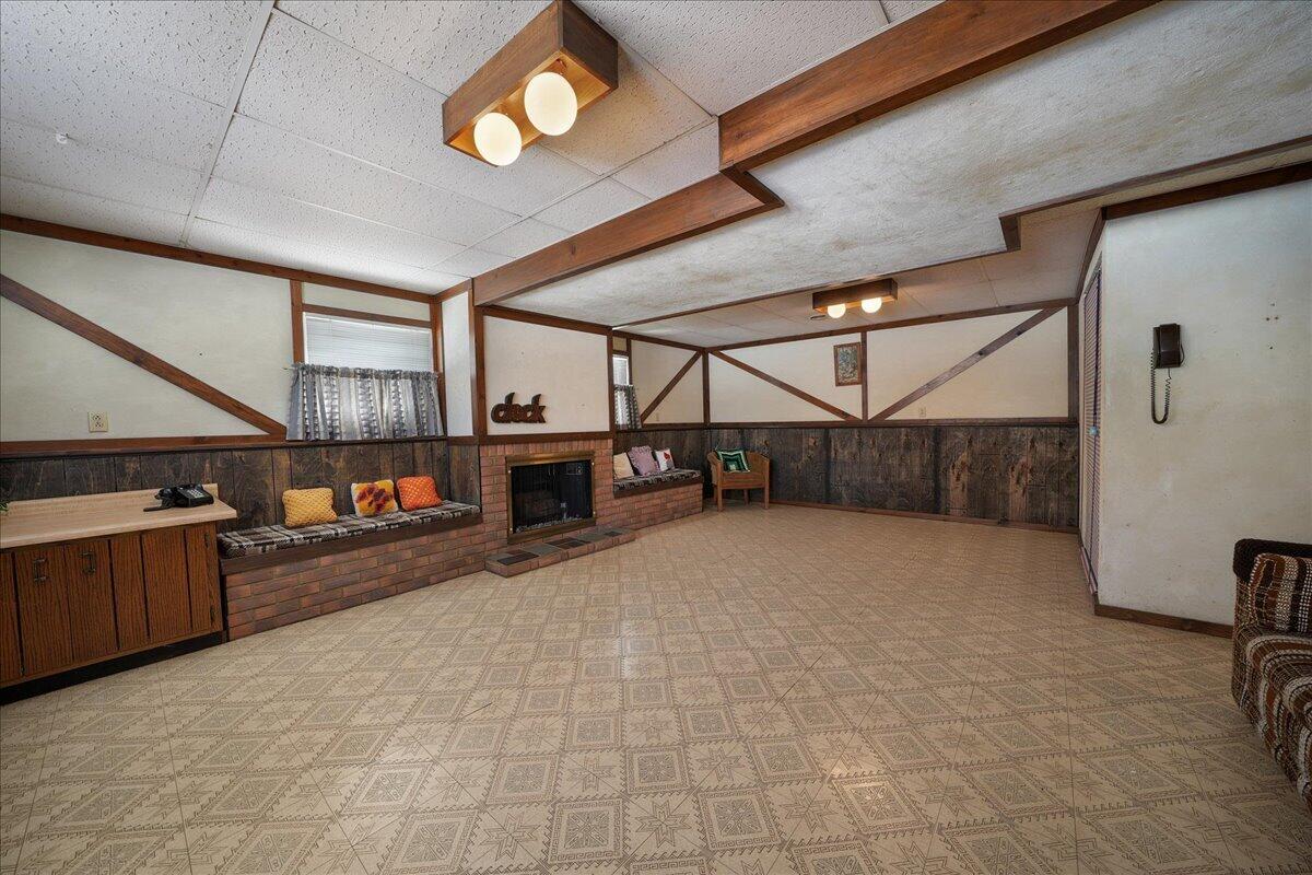 805 West Wilson Street Hebron, IN 46341 - Photo 19 of 27 a view of an empty room with a fireplace