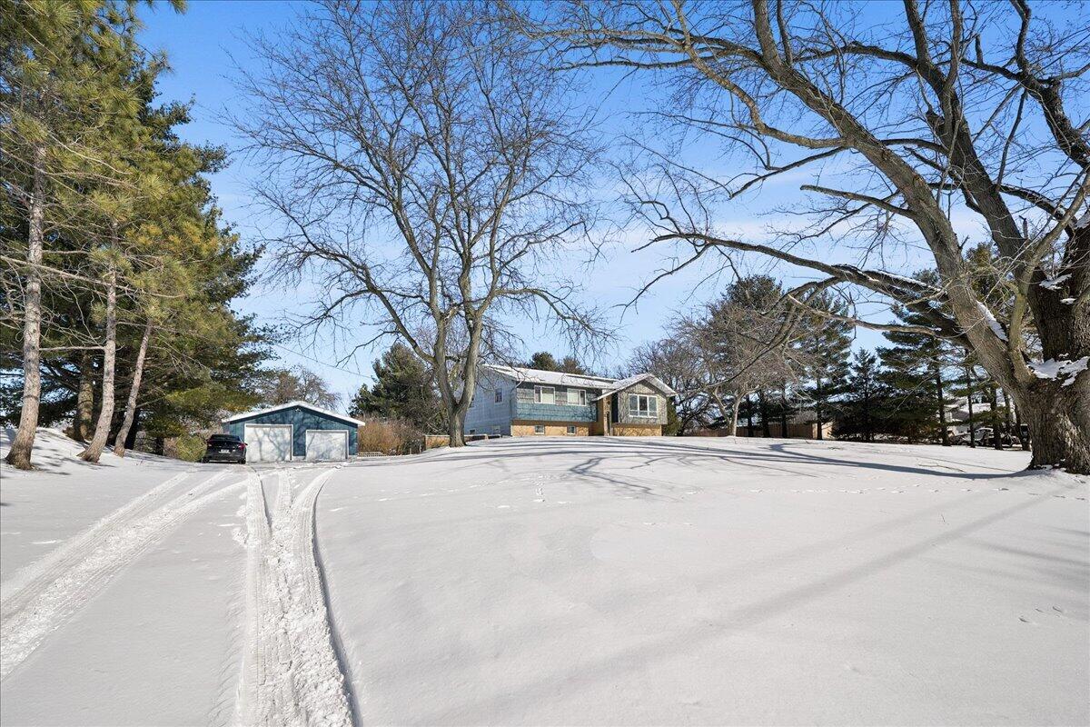 805 West Wilson Street Hebron, IN 46341 - Photo 3 of 27 a street view covered with snow