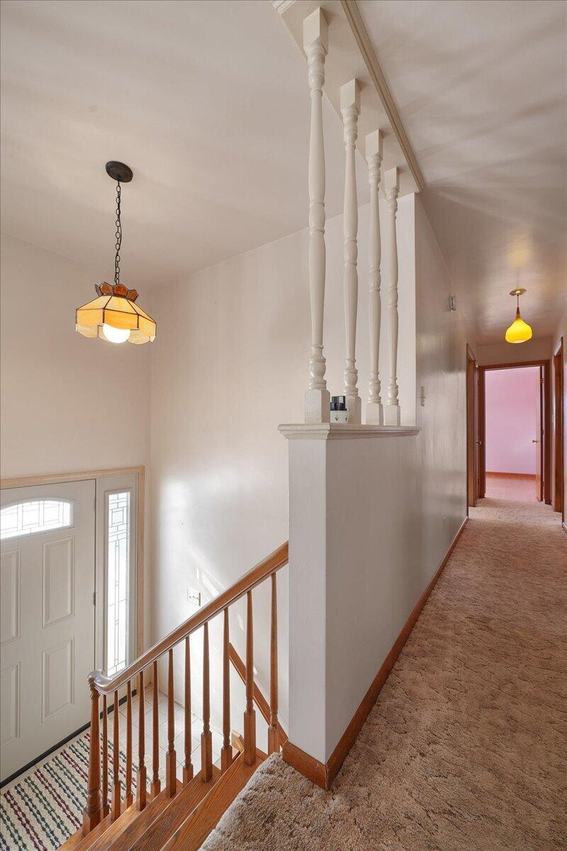 805 West Wilson Street Hebron, IN 46341 - Photo 5 of 27 a view of a room with a window and wooden floor