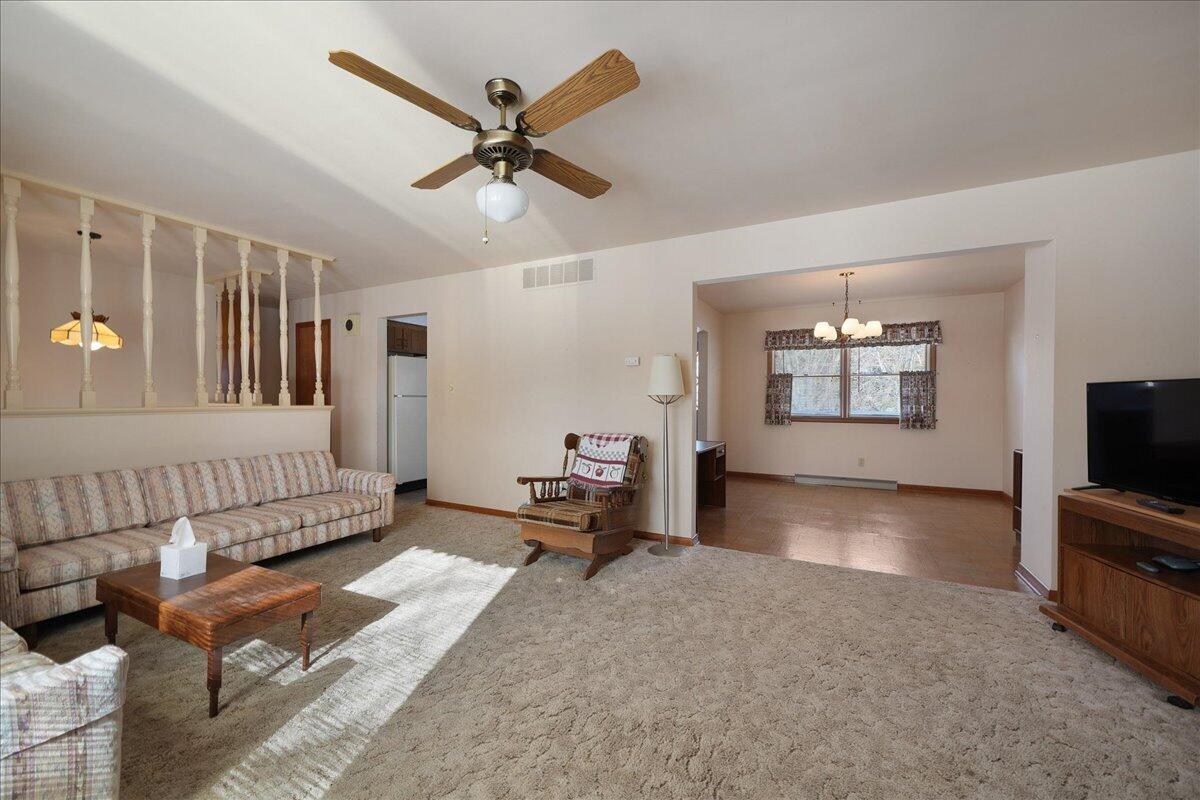 805 West Wilson Street Hebron, IN 46341 - Photo 6 of 27 a living room with furniture and a flat screen tv