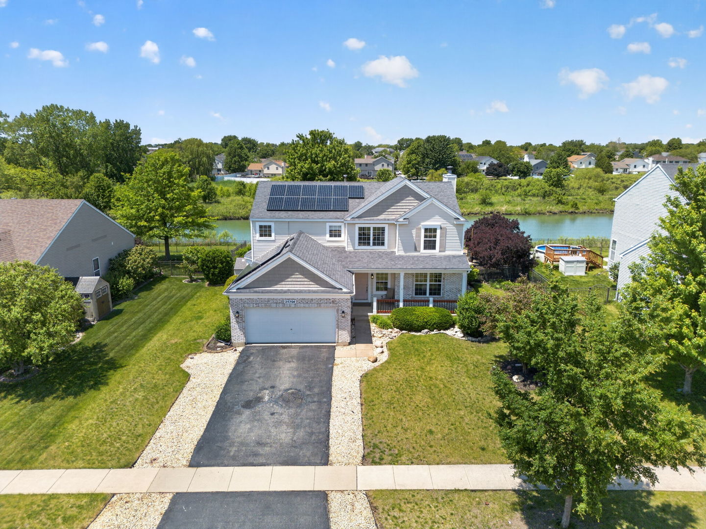 25204 Spring Street Manhattan, IL 60442 - Photo 2 of 34 an aerial view of a house
