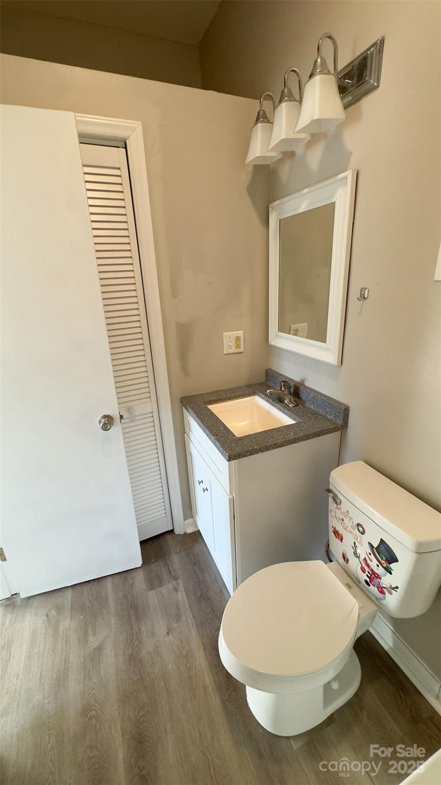 3014 Morgan Mill Road Monroe, NC 28110 - Photo 16 of 26 a bathroom with a granite countertop toilet sink and mirror