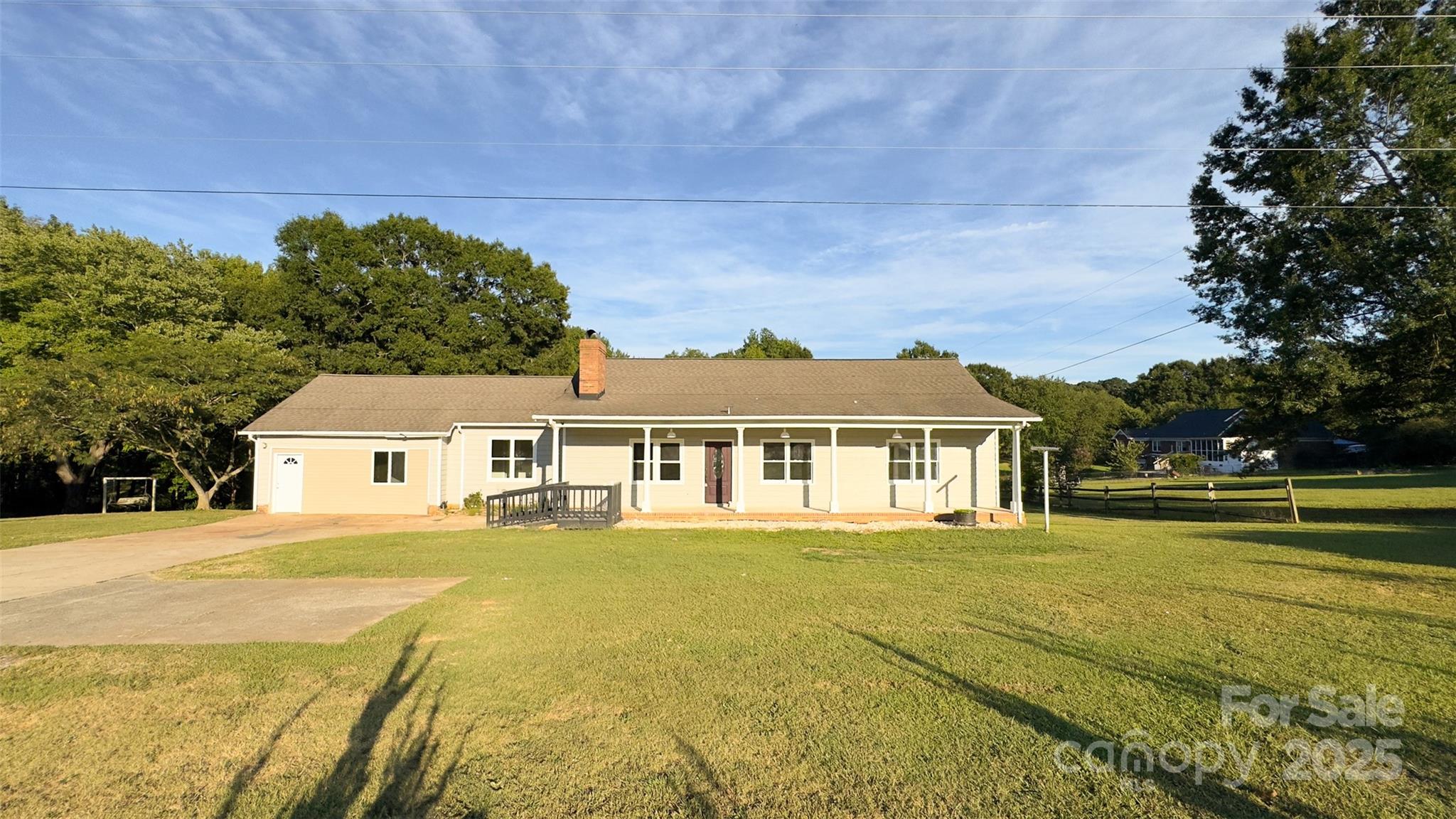 3014 Morgan Mill Road Monroe, NC 28110 - Photo 2 of 26 a front view of a house with a garden