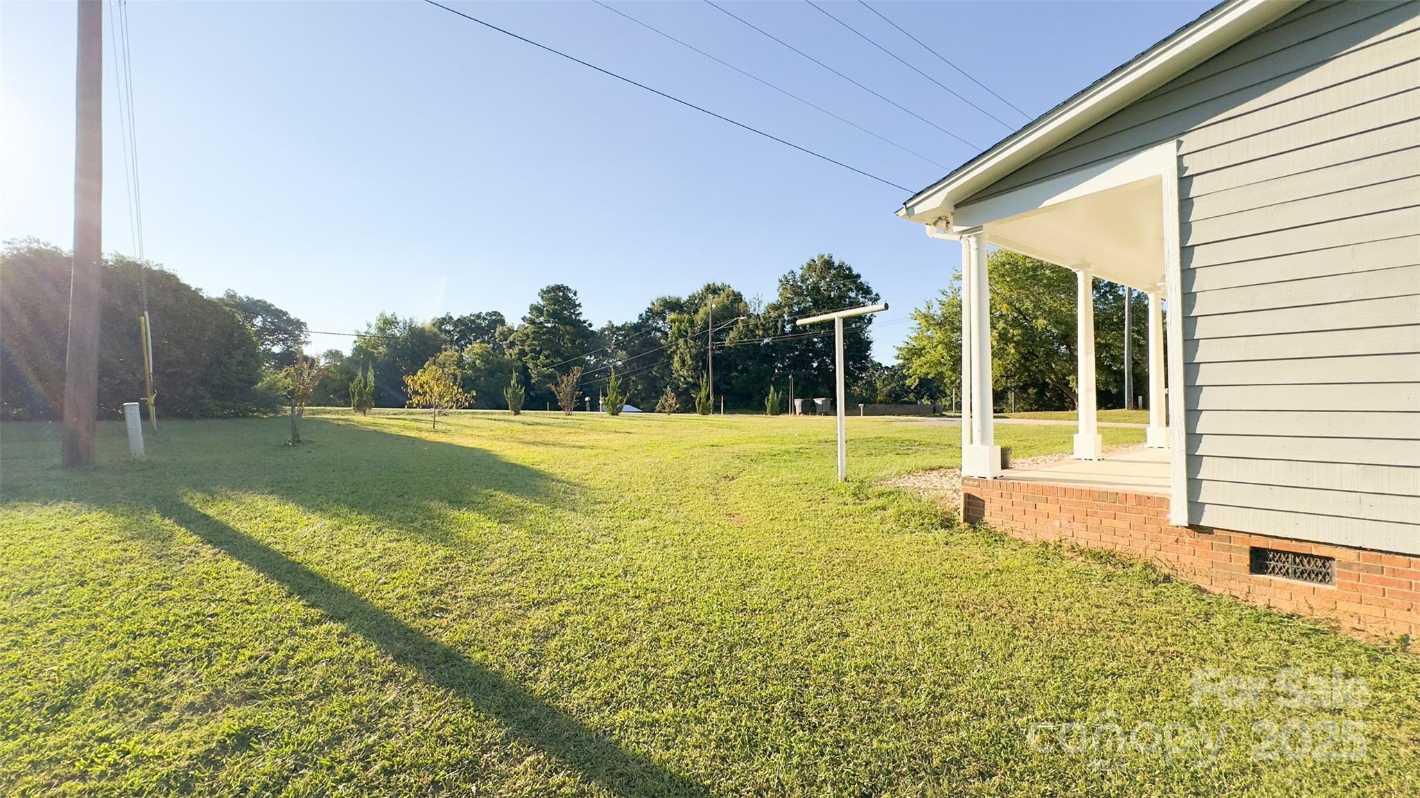 3014 Morgan Mill Road Monroe, NC 28110 - Photo 22 of 26 a view of a swimming pool with a garden