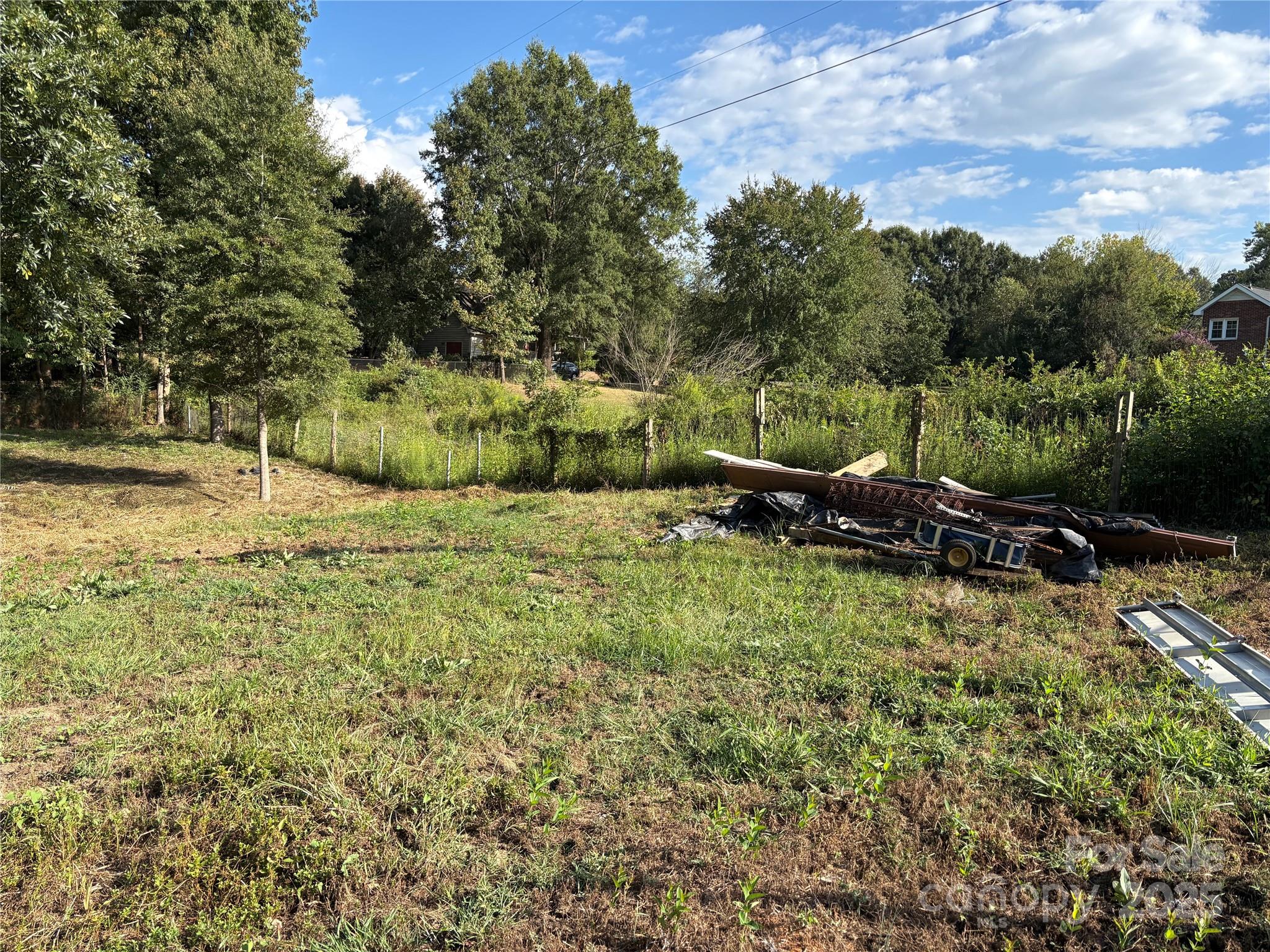 3014 Morgan Mill Road Monroe, NC 28110 - Photo 25 of 26 a view of a lake with houses